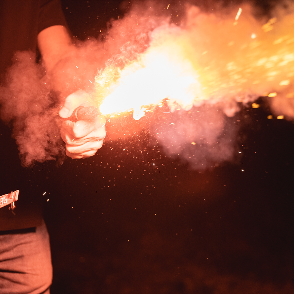 [Person Using the Gen4 2-in-1 Rescue Tool as an Emergency Signal Device, straight from the hand]]